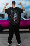 oversized-t-shirt-mockup-of-a-man-trying-to-do-a-frame-pose-on-a-rooftop-m57621 (1)